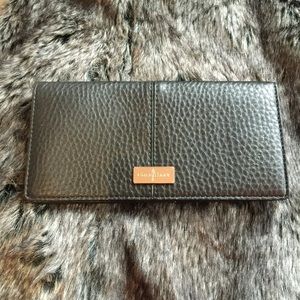 Cole Haan slim black pebble leather wallet.