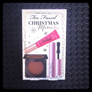 Too faced Christmas. Mascara, bronzer, lipstick