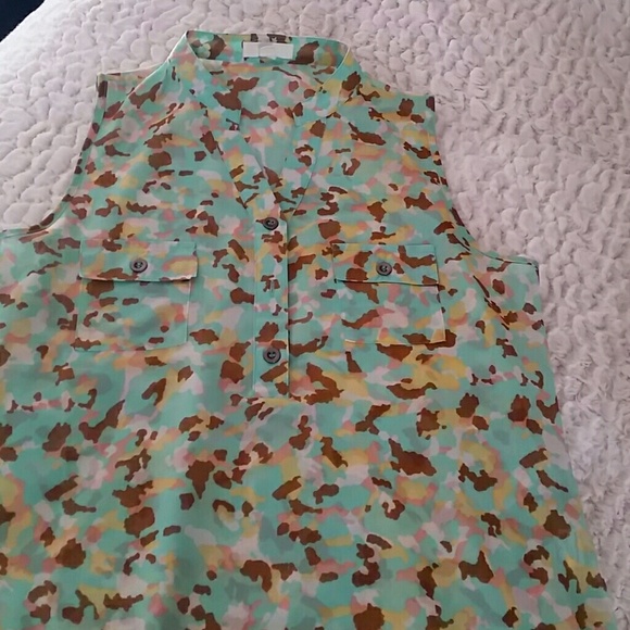 Edge sheer button up tank