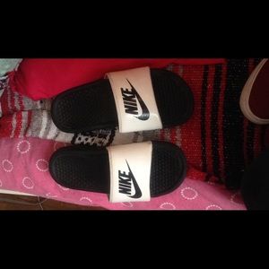 White and black nike sandals