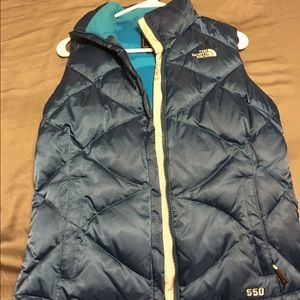 The North Face blue puffy vest
