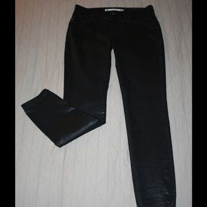 Black shimmer skinny jeans.
