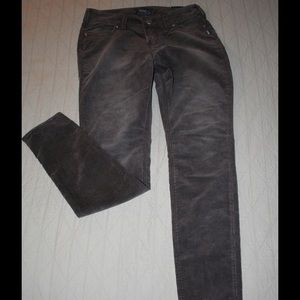 Brown corduroy skinny jeans.