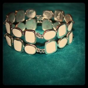 White enamel and silver bracelet.