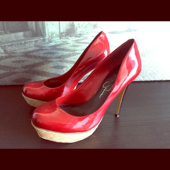 Red Jessica Simpson wedged heel pumps