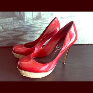 Red Jessica Simpson wedged heel pumps
