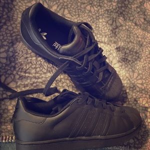 Black on black Adidas superstar size 6