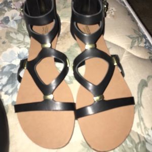 Black and gold sandals