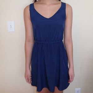 Simple and classy blue sleeveless dress.