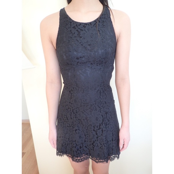 Lace black, tight fitting dress.