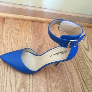 Royal blue heel with ankle strap.