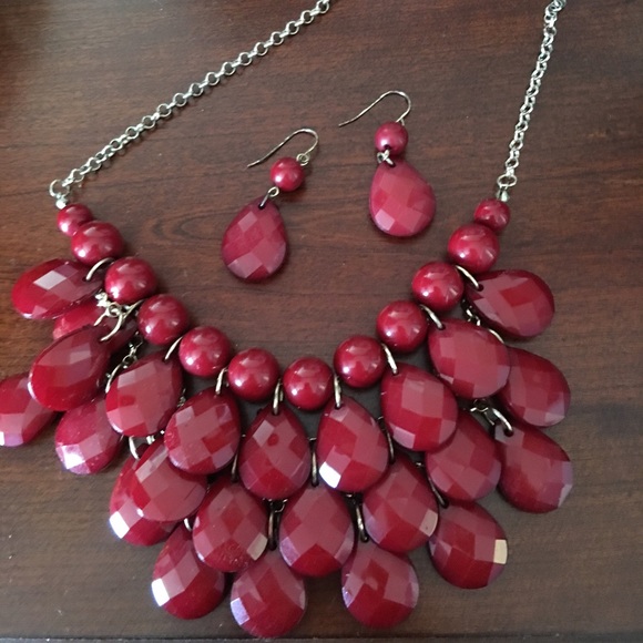 Red necklace and earrings.