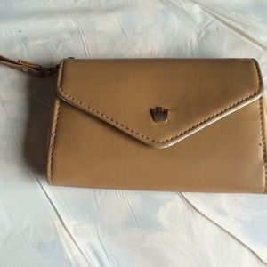 A cute little Wallet, very roomy, but still small