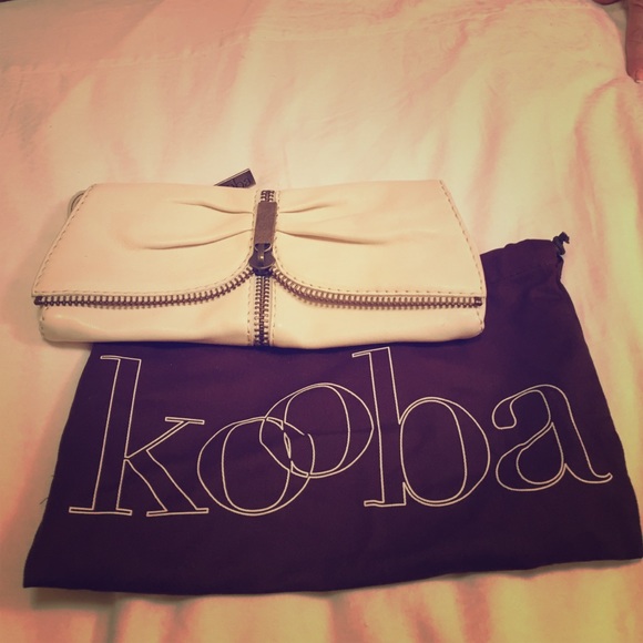 Beige leather Kooba bag with dust