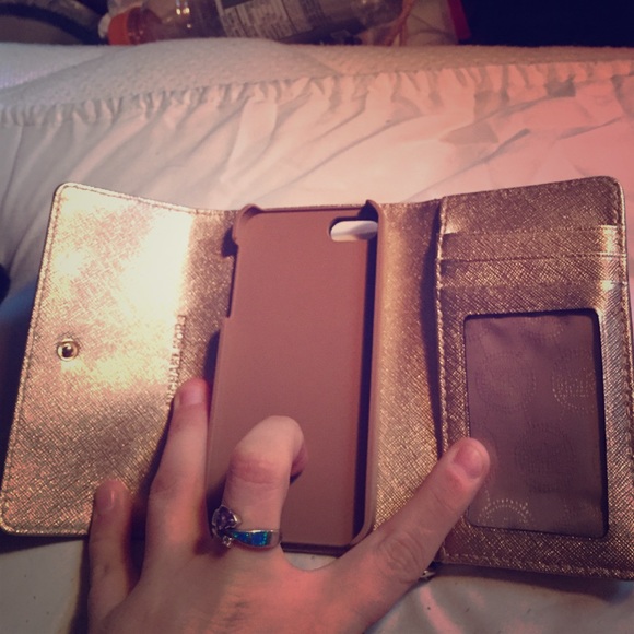 Michael Kors iPhone 5c wristlet. Like new.