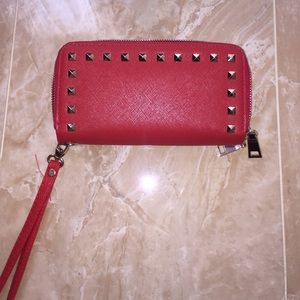 Studded red wallet.
