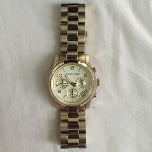 Used Michael Kors gold watch