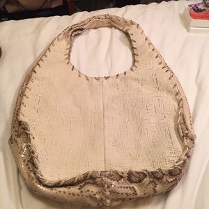 Sandra Roberts, white and snake skin