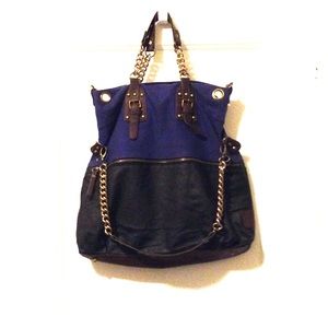 Purple, black, and brown purse