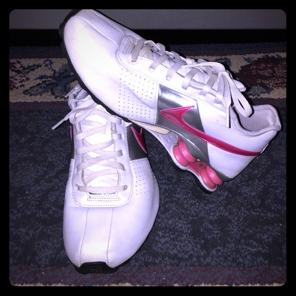 Pink and white Nike Shox