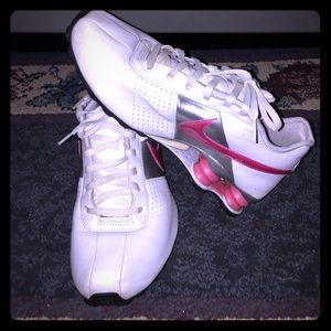 Pink and white Nike Shox