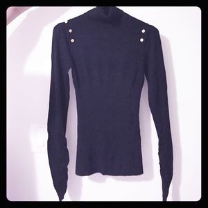 Black turtleneck sweater