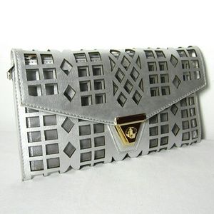 NWT Silver Laser Cut Clutch Purse