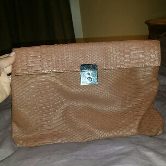 Snake skin leather clutch