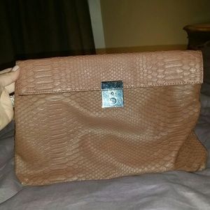 Snake skin leather clutch