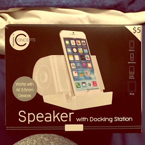 White iConcepts speaker w/ docking station.