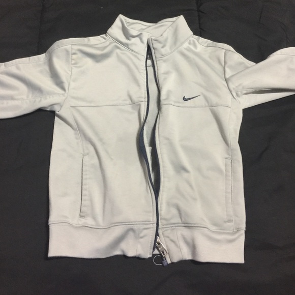 Grey Nike jacket size 4. Worn several a times.