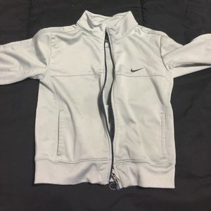 Grey Nike jacket size 4. Worn several a times.