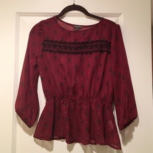Sheer blouse with lace detail. Size XS.