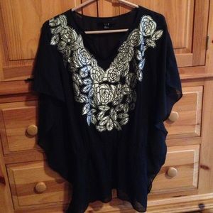 Beautiful, shear black blouse