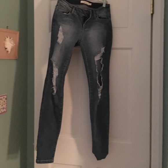 Ripped light wash skinny jeans
