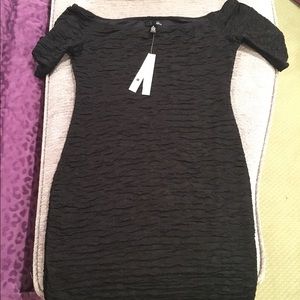 Aqua dress. Unworn with tag on it.