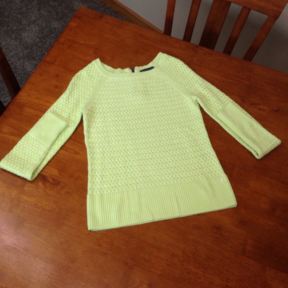 A very cute sweater with a zipper in the back!