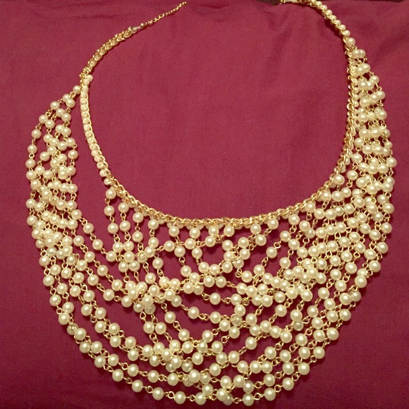 Pearl overlayed necklace.