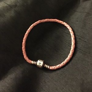 Pink pandora bracelet.