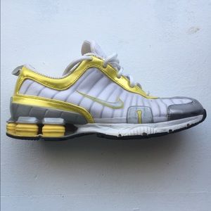 White yellow and silver Nike shox