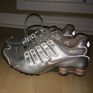 Silver and pink Nike shox