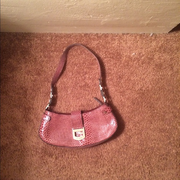 Purple snake print Guess purse.