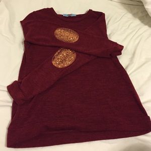 Sweater with elbow patches