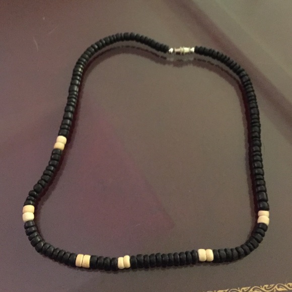 Black, sand color beads from Hawaii