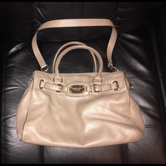 Michael Kors bag with w/ cross body carry option.