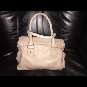 This Cole Haan bag is sophisticated and eye catchy