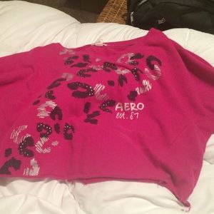 a cute magenta colored cropped sweater w/ sequins