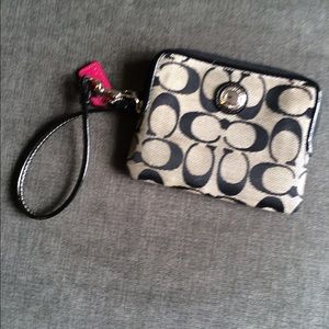 SOLD .. Authentic coach  wristlet