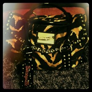 Betseyville leopard print duffel style handbag Betseyville leopard print duffel style handbag