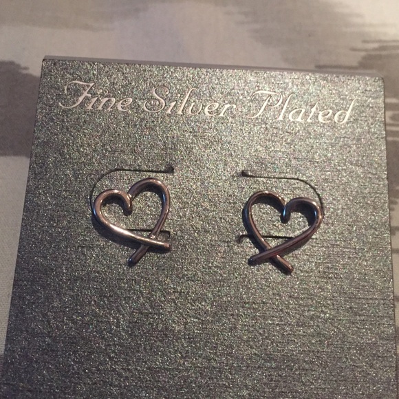 NEW on original card, silver plated heart studs
